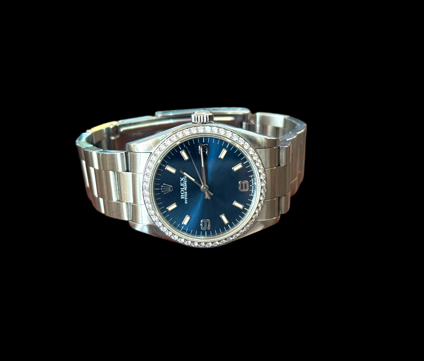 Ladies Rolex Oyster Perpetual Blue Facd and Diamond Bezel 31mm