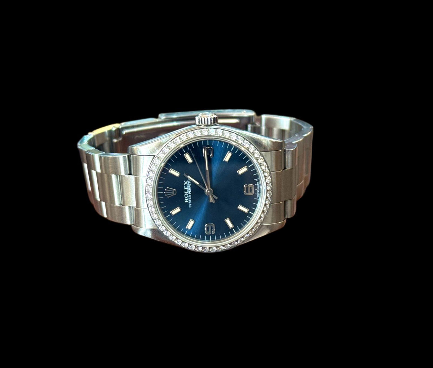 Ladies Rolex Oyster Perpetual Blue Facd and Diamond Bezel 31mm