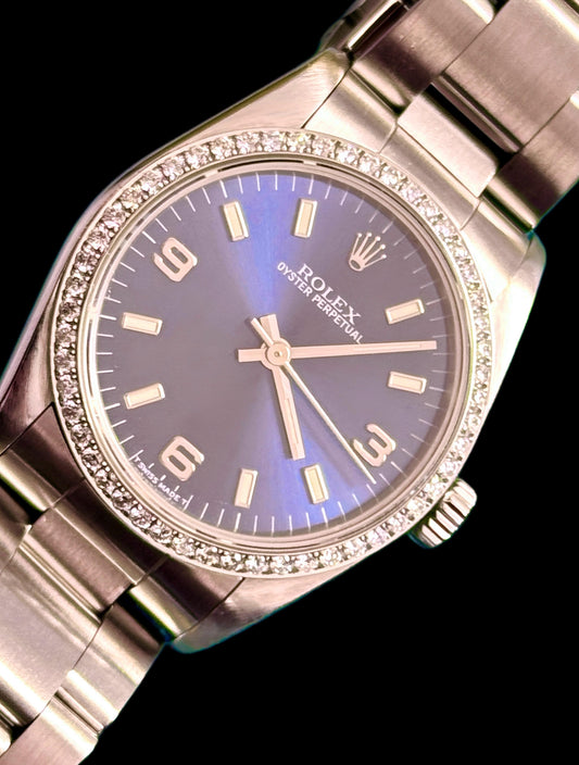 Ladies Rolex Oyster Perpetual Blue Facd and Diamond Bezel 31mm