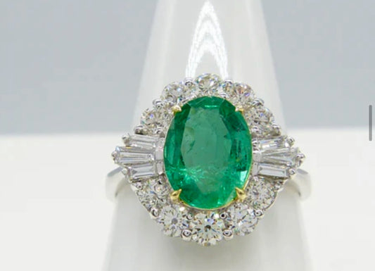 Oval Emerald and Baguette Diamond 18ct White Gold Ring