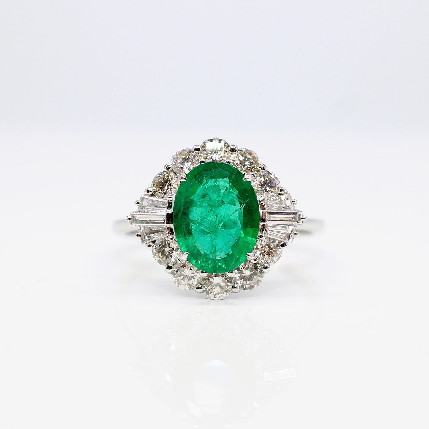 Oval Emerald and Baguette Diamond 18ct White Gold Ring