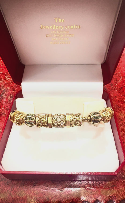 Emma & Roe 10ct solid gold charm bracelet