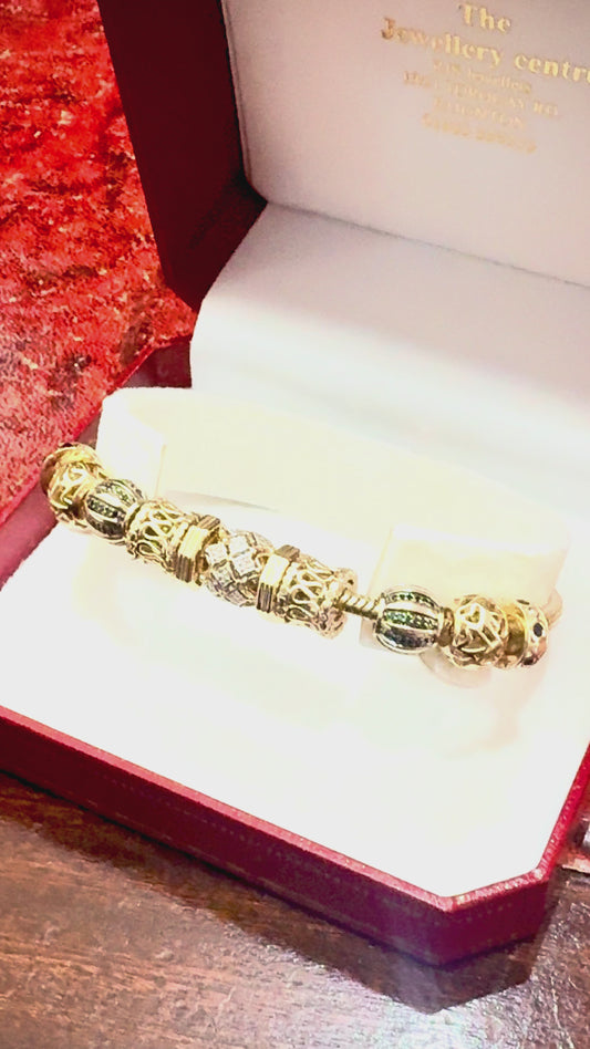 Emma & Roe 10ct solid gold charm bracelet